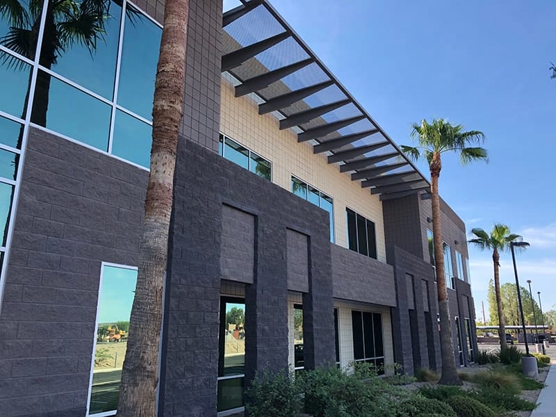 Side view of newly painted commercial office building in phoenix area